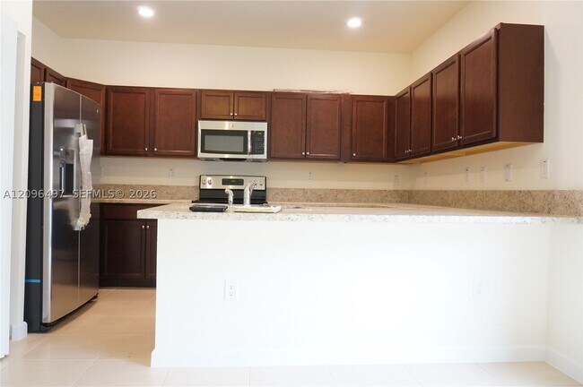 Building Photo - 9345 W 33rd Ln