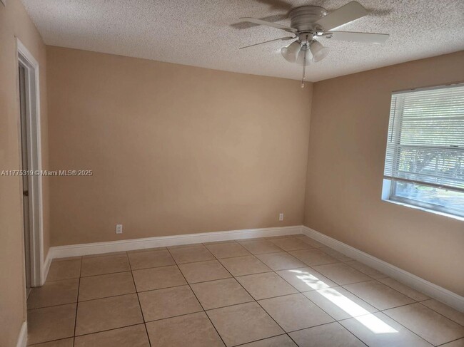 Building Photo - 8750 Royal Palm Blvd