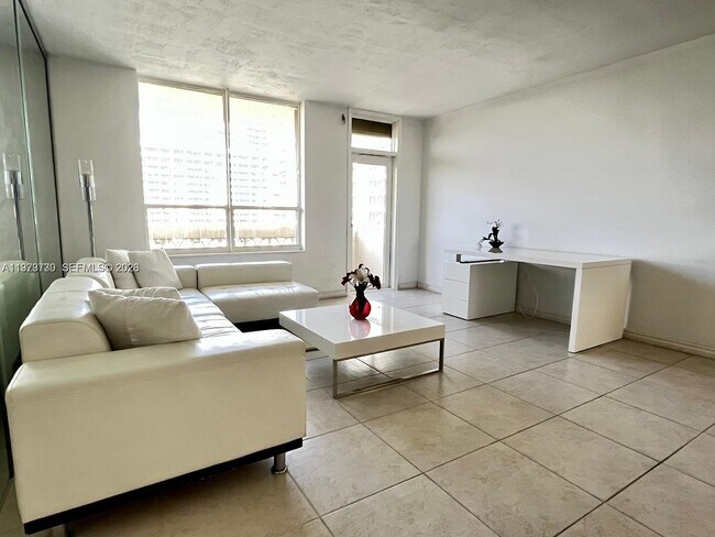 Building Photo - 10185 Collins Ave