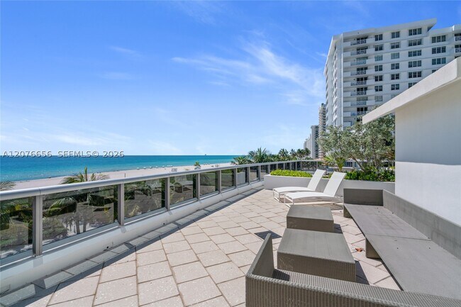 Building Photo - 5875 Collins Ave