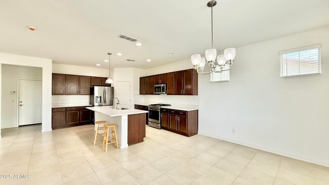 Building Photo - 10935 E Tesla Ave