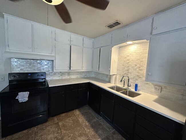 Building Photo - First Months Free! Four Bedroom in Tech Te...