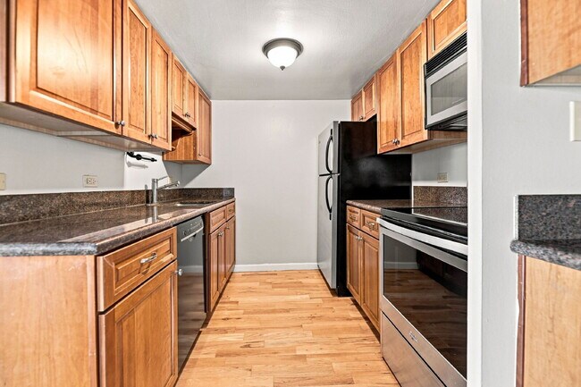 Building Photo - $1,670.95 with $300 Off the first month's rent - 2 Beds, 1.5 Bath, Condo in Denver with Balcony!