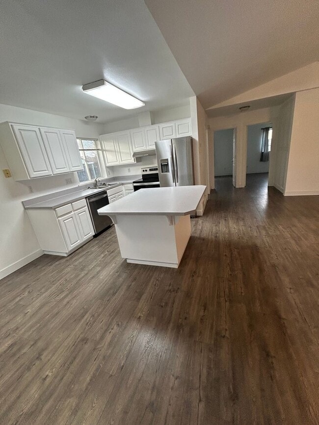 Building Photo - Beautifully Remodeled 2 Bedroom 1 Bath Duplex w/ Large Yard!! Pets are welcome! Electric car char...