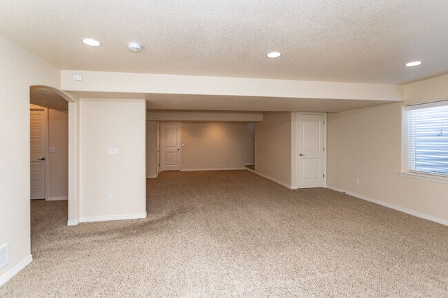 Building Photo - Spacious 5-Bedroom Home with Finished Base...