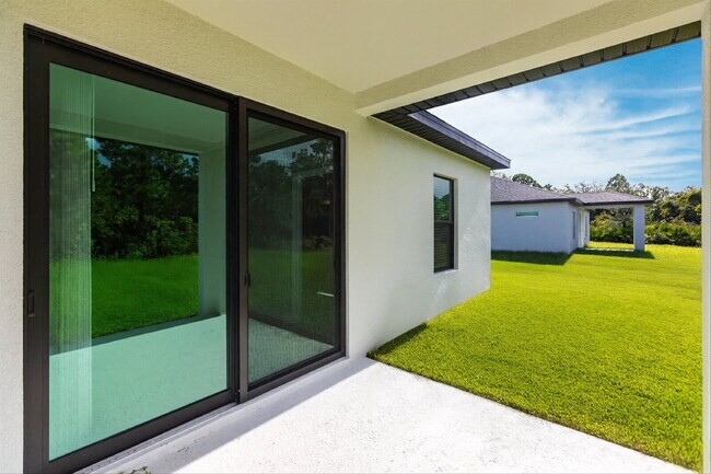 Building Photo - Brand New 4-Bedroom Gem with 2 Full Baths on Large Lot in Lehigh Acres – A Perfect Family Haven!