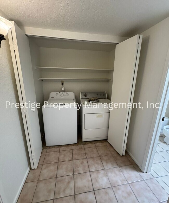 Building Photo - Totaling 3/3 With The Guest House; This Lovely Central Townhome is Everything You Need!