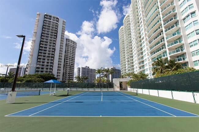 Building Photo - 20201 E Country Club Dr