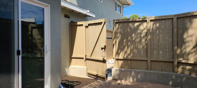 access to rear driveway parking and garage - 120 Cadmus St