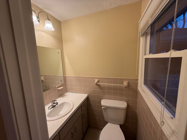 Building Photo - Updated 4BR Home with Finished Basement & Level Yard