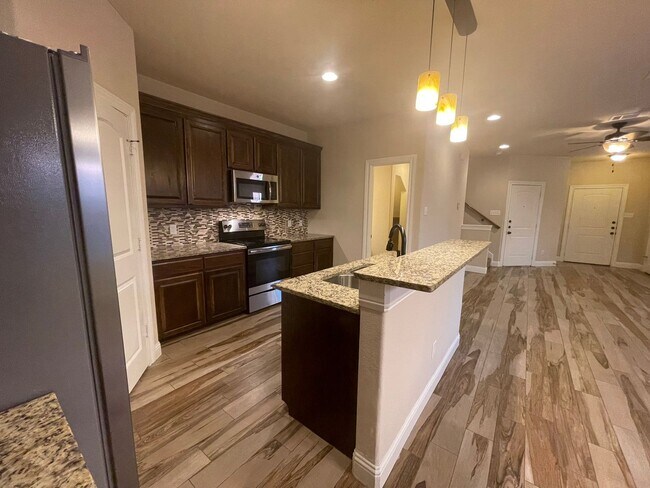 Building Photo - Beautiful Benbrook 3B/2.5B Townhome ((Stainless Steel Appliance Package)) Dazzling wood-like tile...