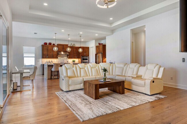 Building Photo - Resort-Style Furnished Lakefront Living in SilverLeaf | 100” Theater & Golf Cart Included