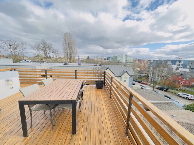 Building Photo - 3 Bedroom Central District Townhome w/ Garage, AC & Rooftop Deck