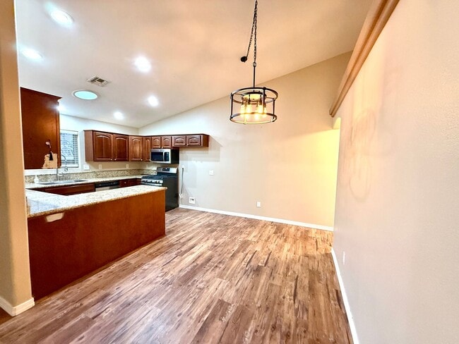 Building Photo - Beautiful 3-Bedroom Home with Solar!—Near Hualapai Mountain Rd