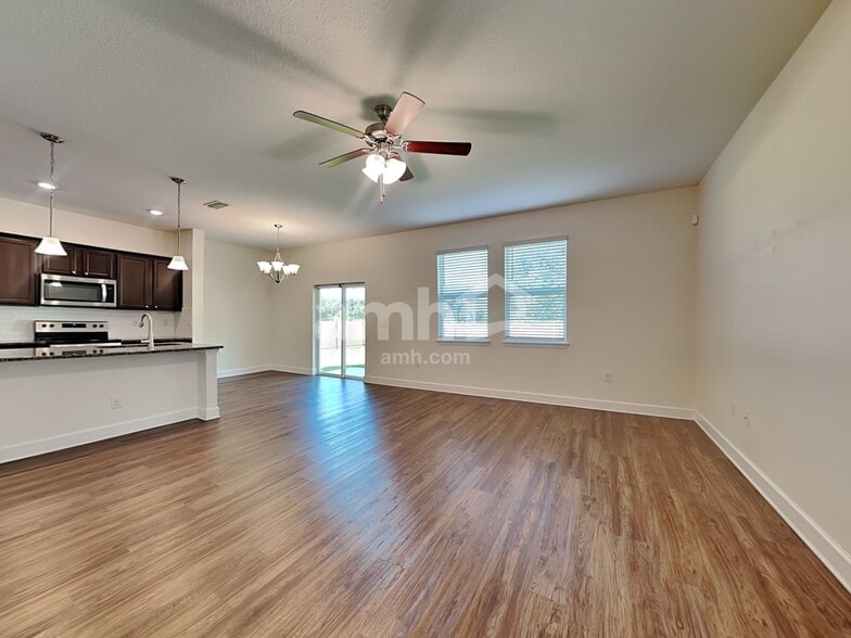 Building Photo - 6605 Hidden Rose Pl