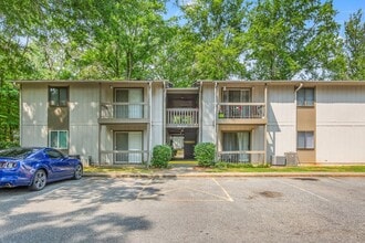 Building Photo - Furnished 1-Bedroom Condo with Modern Upda...