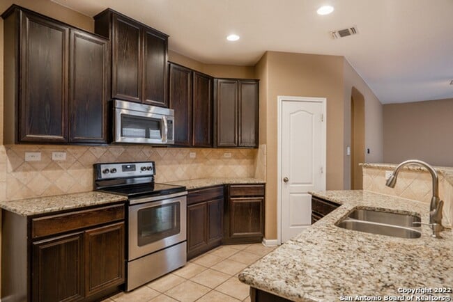 Building Photo - Comfortable Living in a Gated Community Near It All