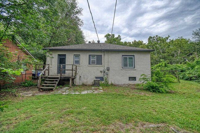 Building Photo - Newly Remodeled Campus Property! Lawn Care Included!