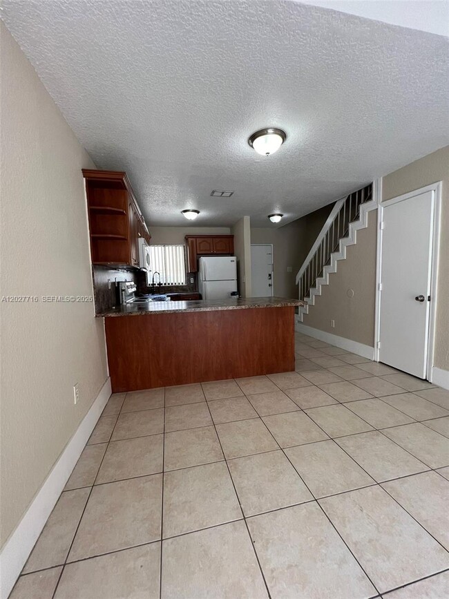 Building Photo - 5694 W 25th Ct