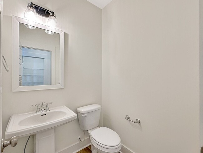 Building Photo - Beautiful, 3-Bedroom Midtown Nexton Townhome with Garage & Amenities