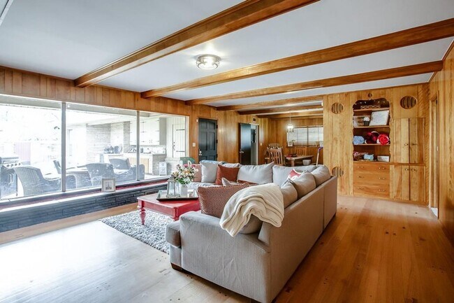 Building Photo - Spacious 4-Bedroom Home with Dual Living Areas