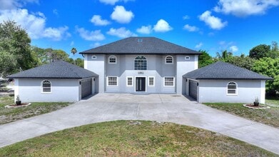 Building Photo - Rare Luxury Lease Opportunity | Spectacular 5-Bedroom Pool Estate on Nearly ¾ Acre Near Gulf Beaches