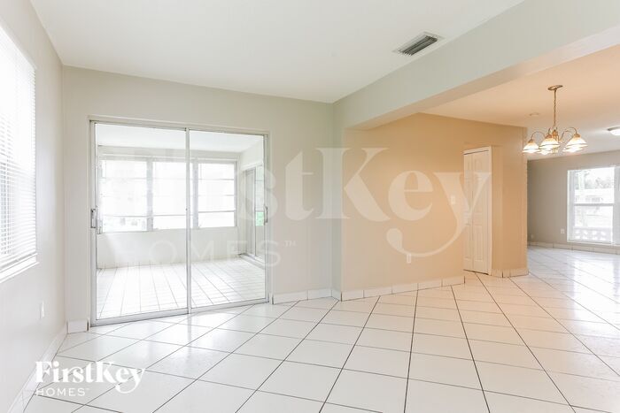 Building Photo - 6891 NW 25th Ct