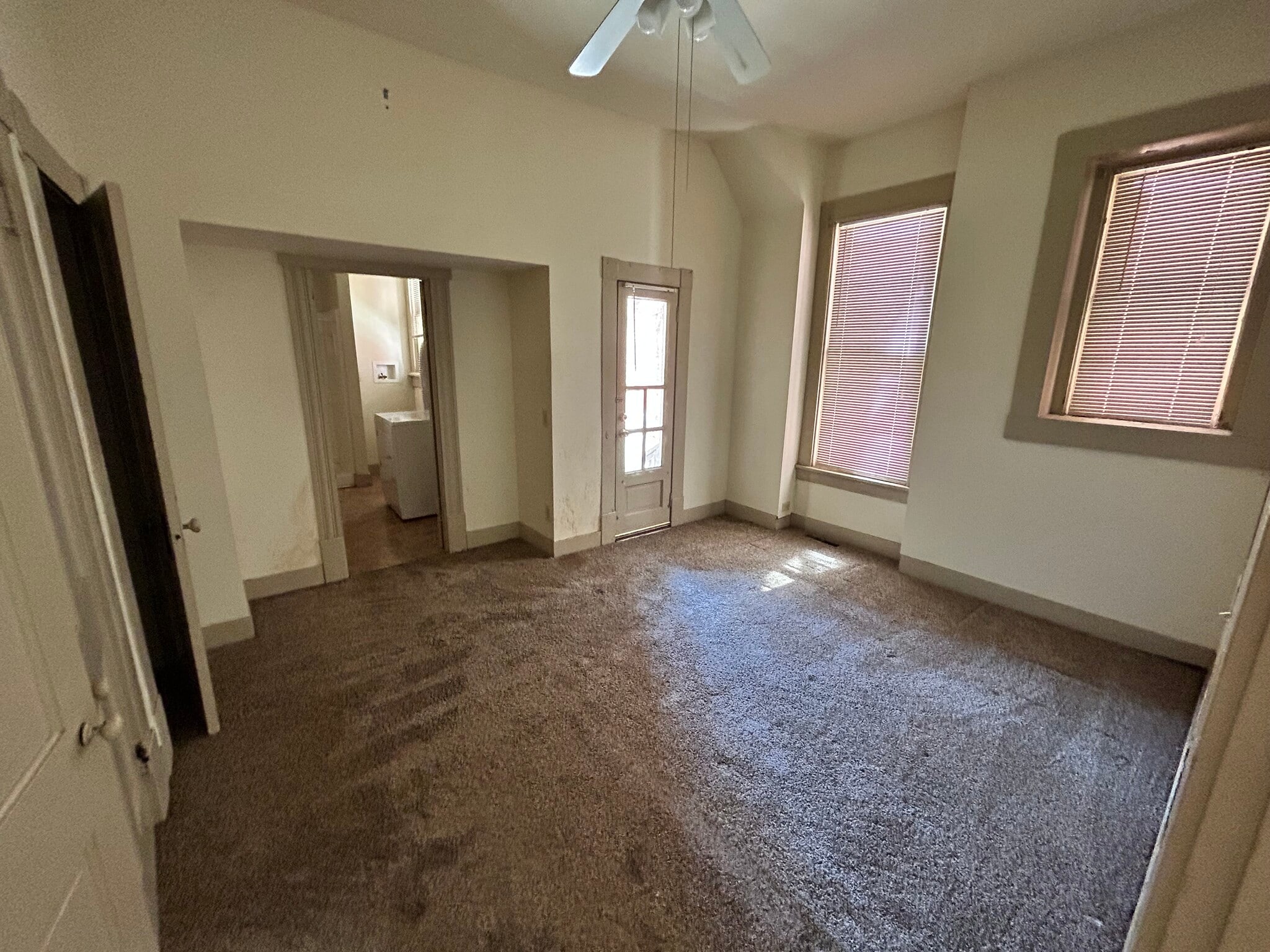 bedroom (old paint scheme) with full bath thru left doorway - 83 W 2nd Ave