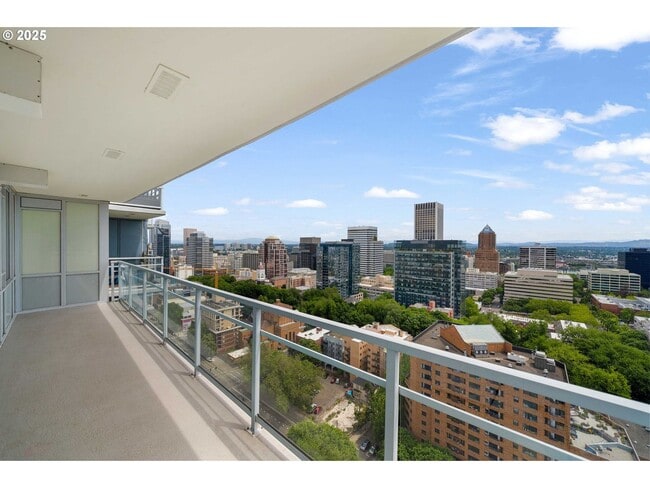 Building Photo - Modern 2-Bed/2-Bath Condo with Balcony & Prime Downtown Location
