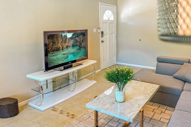 Building Photo - Modern Retreat with Spacious Yard & Cozy Interiors