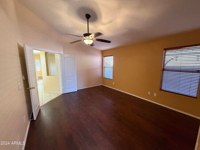 Building Photo - 9641 E Onza Ave