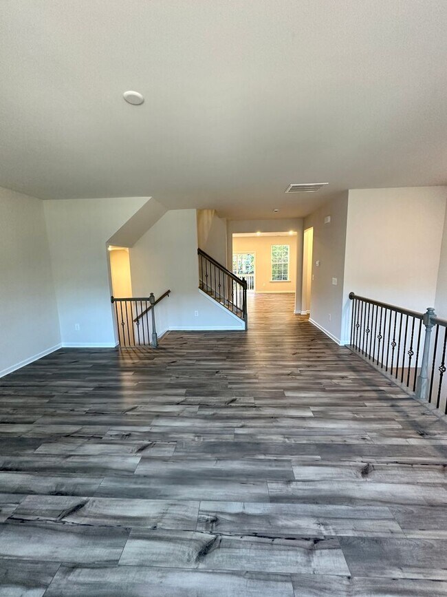 Building Photo - 4BR/3.5 Bath Townhouse in Prime Ballantyne Location; Great Schools