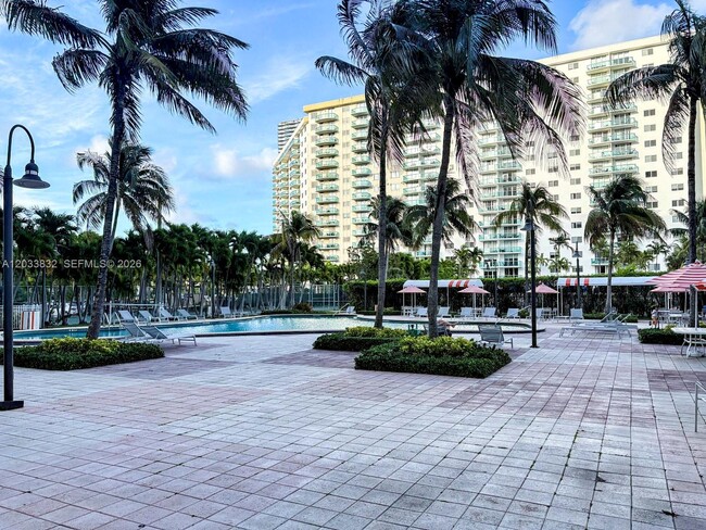 Building Photo - 19380 Collins Ave