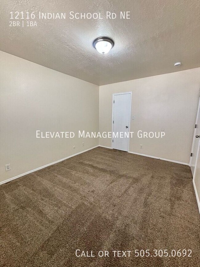 Building Photo - 12116 Indian School Rd NE