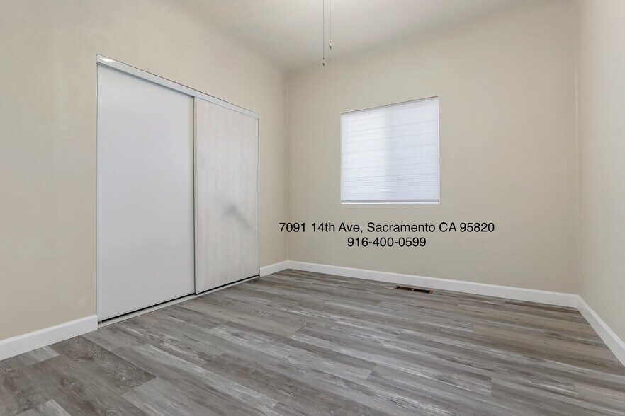 Building Photo - 7091 14th Ave