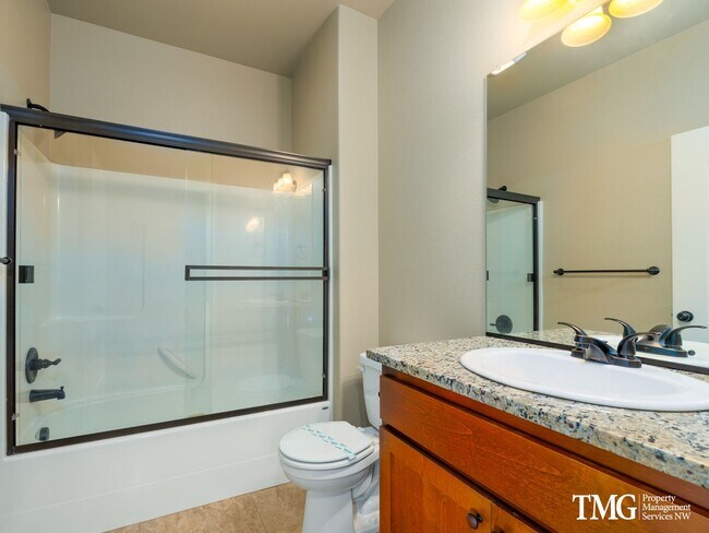 Building Photo - Centrally Located Townhome with Attached Garage & AC