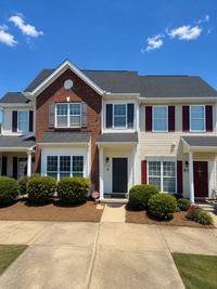 Building Photo - Beautiful 3-Bedroom Townhome with Pond View | Lawn Care Included | Convenient Whitsett Location