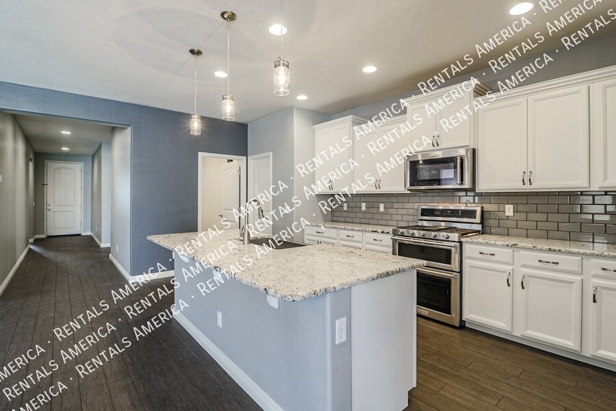 Building Photo - 10910 E Calypso Ave