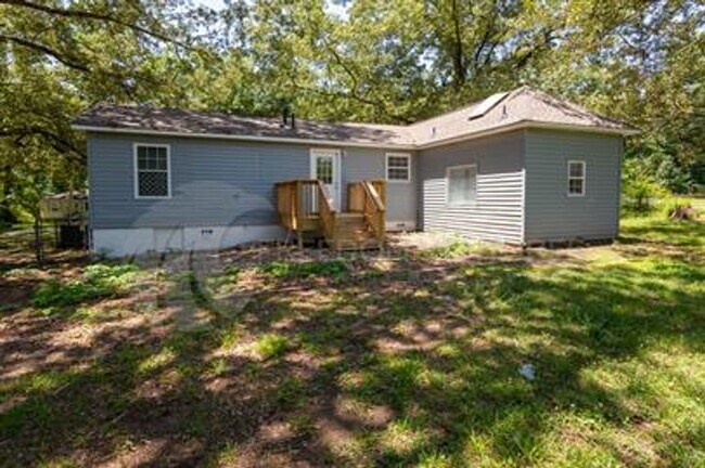 Building Photo - Flexible 3BR/2BA or 2BR + Den Home