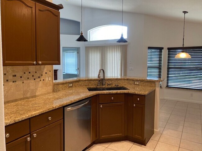 Building Photo - Lakefront 3-Bedroom Pool Home in Gated Com...