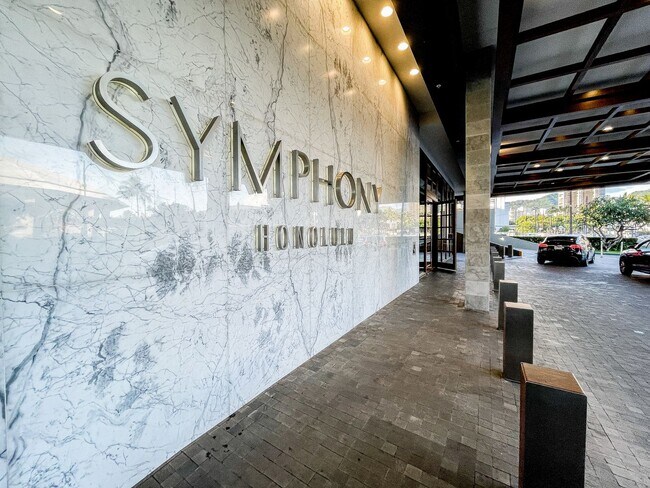 Building Photo - Furnished Symphony Condo with Direct Ocean Views and Two Parking