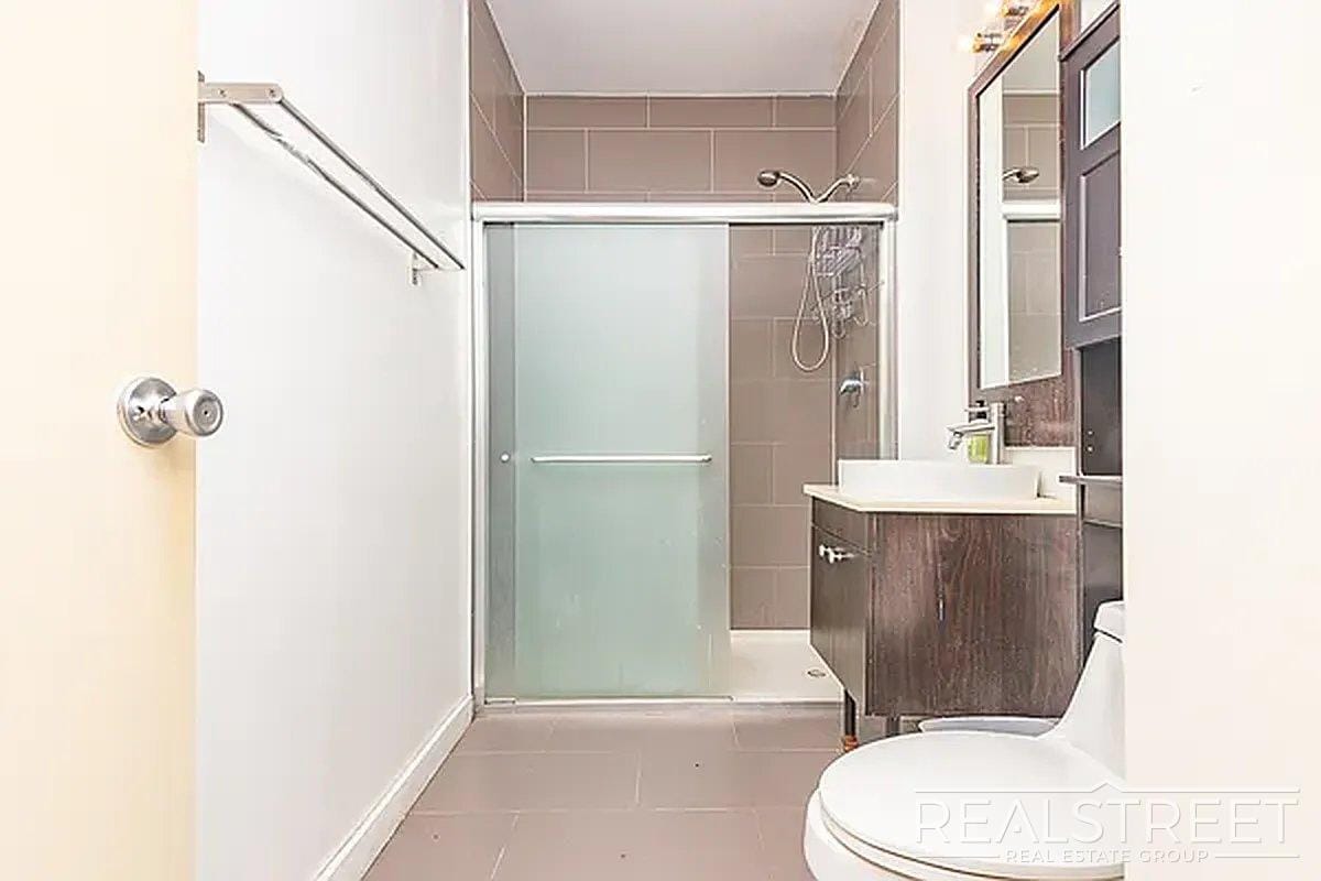 Building Photo - Massive Outdoor Patio | Spacious 3BR/2BA Apartment in Bushwick–East Williamsburg