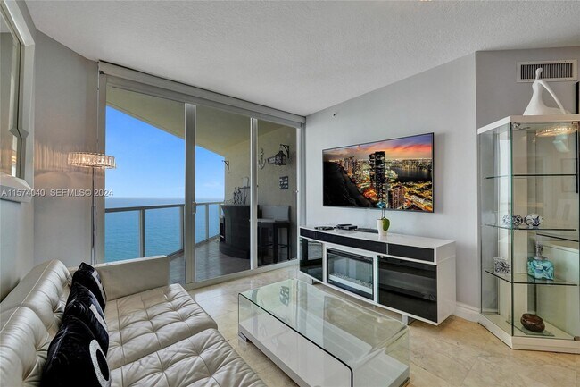 Building Photo - 16699 Collins Ave