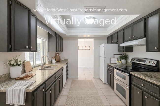 Building Photo - GULF GATE SARASOTA! OUTSTANDING 3 BEDROOM/2 BATH HOME WITH EXTRA LARGE YARD!