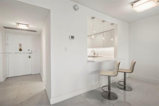 Building Photo - 5401 Collins Ave