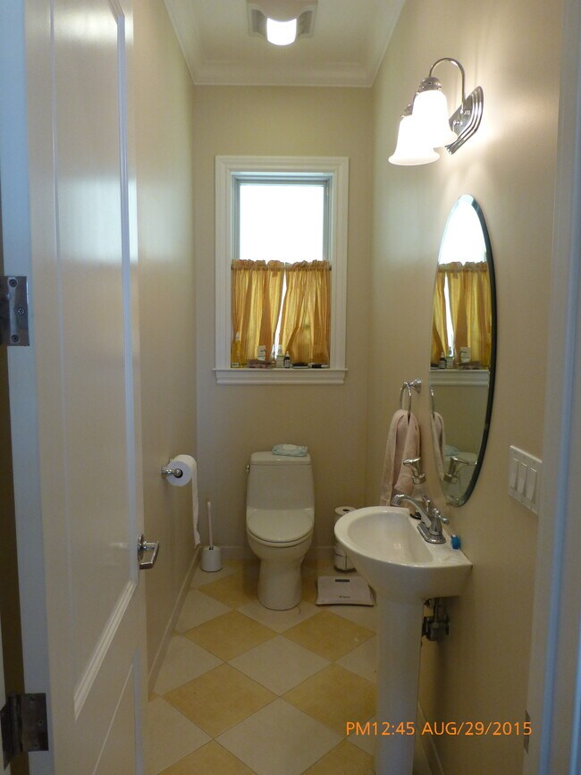 half-bathroom next to living room - 1596 Dolores St