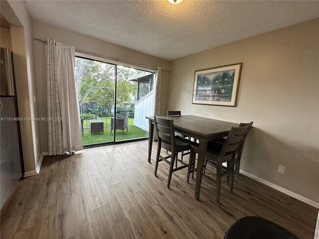 Building Photo - 6060 Village Cir N