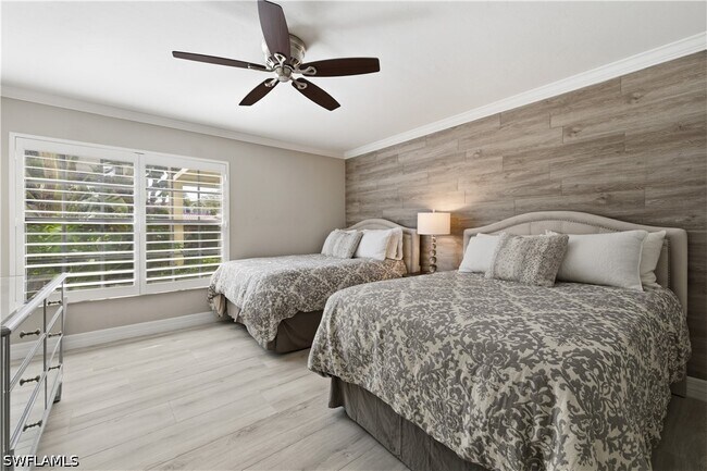 Building Photo - 6080 Pelican Bay Blvd