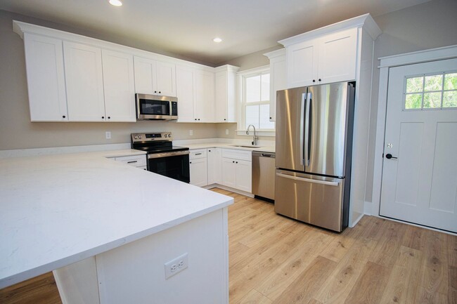 Building Photo - "Welcome to Olympia – Brand New Units!" Sp...
