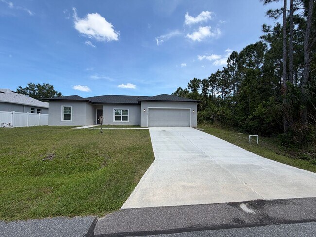 Building Photo - Adorable 3 Bedroom / 2 Bathroom Home in Palm Bay!!